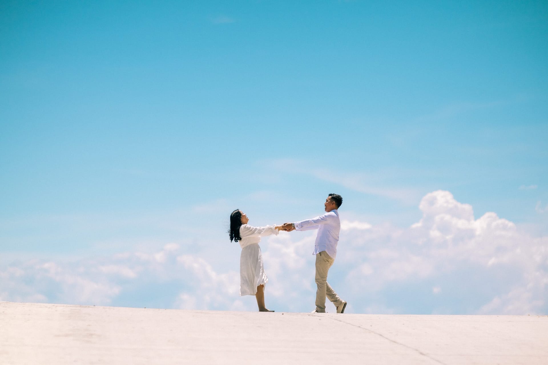 A dancing celebratory couple